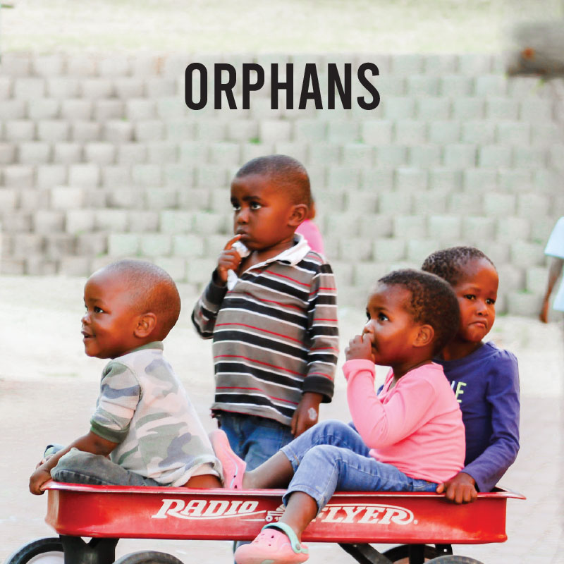 Children in a wagon for orphans button.