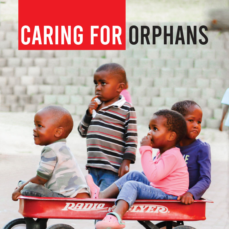 Children in a wagon for caring for orphans button.